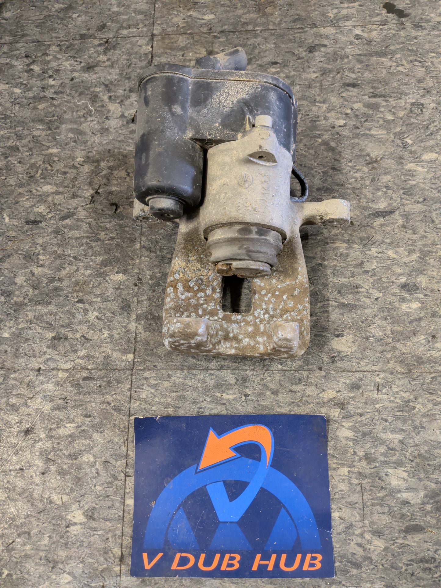 B6 driver rear caliper